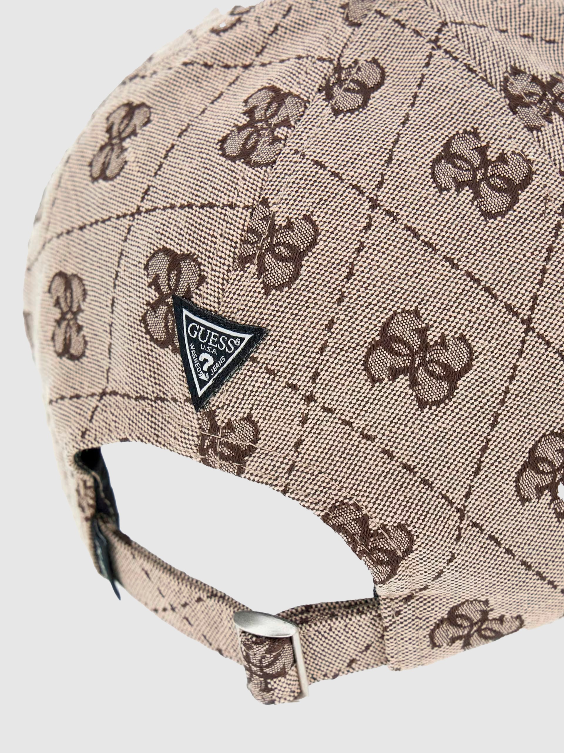 Caps Woman Guess