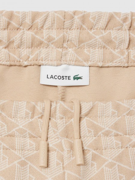 Cal�as Lacoste Mulher